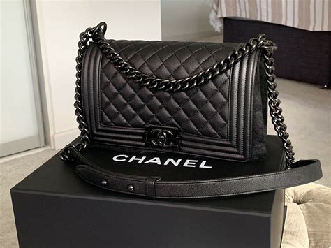 chanel all black boy bag|Chanel black boyfriend bag.